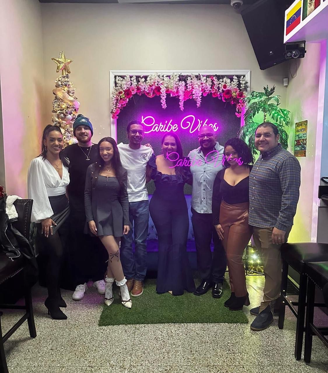 Fermin, Maggie and their daughters in matching Caribe polos