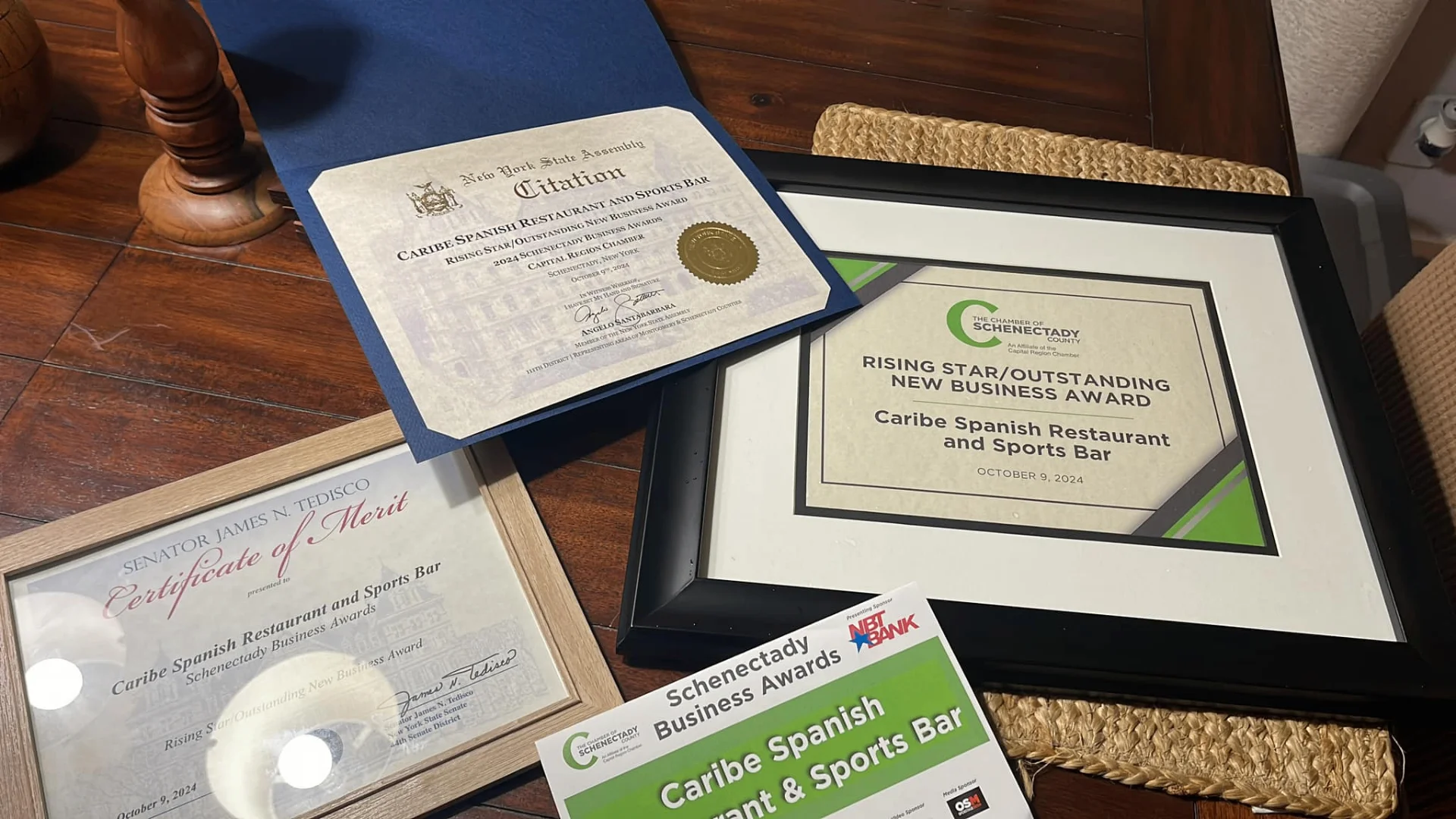 Framed Citation, Certificate of Merit, and Rising Star award for Caribe